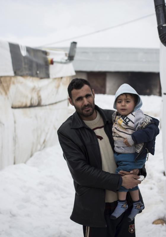 Padre e hijo refugiados Padre e hijo refugiados