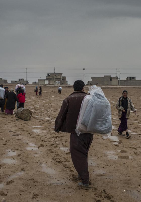 Personas huyendo del conflicto en Irak, Mosul